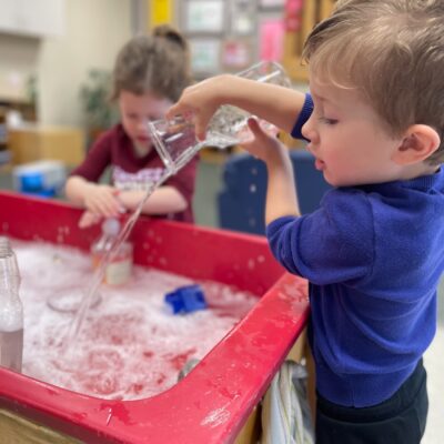 Kid pouring water