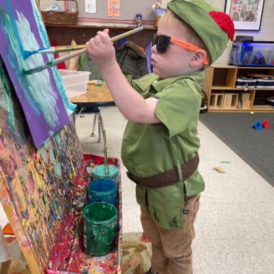 Little boy painting