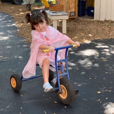 Little girl riding a bike